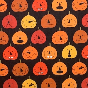 May include: A repeating pattern of cartoon pumpkins in shades of orange, yellow, and brown on a black background. Each pumpkin has a unique, smiling or surprised face. The pumpkins are stylized with green stems.