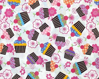 Brightly colored decorated cupcakes on white fabric, whimsical flowers cotton woven novelty, fun apron project material funky girly J23