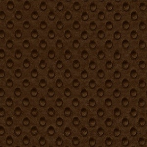May include: Brown fabric with a textured pattern of small raised circles.