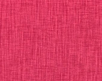 May include: A close-up of a pink textured fabric with a subtle woven pattern.