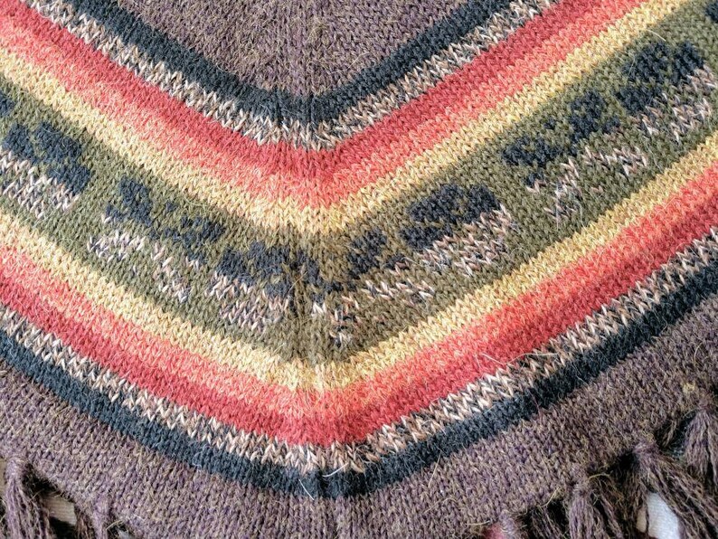 Alpaca poncho turtleneck dark rainbow orange Peru Bolivia XSS fringed brown red hippie boho ethnic stripes warm soft pure floral border