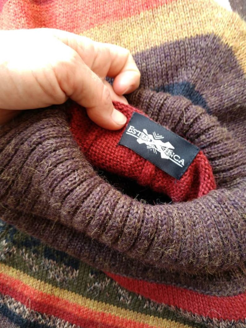 Alpaca poncho turtleneck dark rainbow orange Peru Bolivia XSS fringed brown red hippie boho ethnic stripes warm soft pure floral border