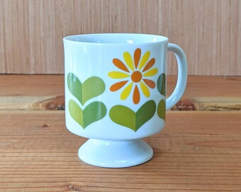 Sixties mod pedestal footed mug orange flower green heart leaves 8 ounce