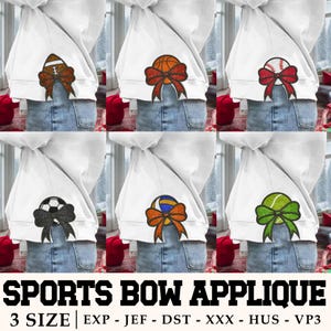May include: Six white sweatshirts with different sports ball designs on the front. Each design features a red bow with a different colored ball in the center. The balls are a football, basketball, baseball, soccer ball, volleyball, and tennis ball. The text "SPORTS BOW APPLIQUE" is at the top of the image and "3 SIZE | EXP - JEF - DST - XXX - HUS - VP3" is at the bottom.