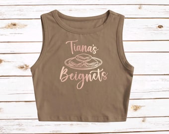 Camiseta corta de Tiana's Beignets Disneyland WDW Disneyworld Camiseta corta Princesa y Príncipe Sapo La aventura de Tiana en el pantano