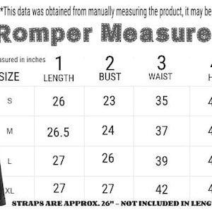 May include: A black romper on a hanger next to a size chart titled Romper Measurements. The chart lists sizes S, M, L, and XL with columns for length, bust, waist, hip, and thigh in inches. Text notes straps are approximately 26 inches long.