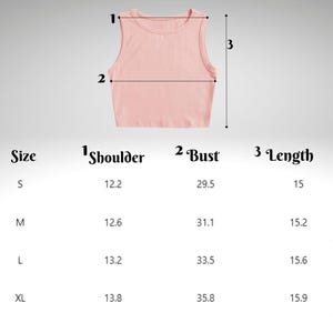 May include: A light pink crop top with a round neckline. The image includes a size chart with measurements for shoulder, bust, and length in inches for sizes S, M, L, and XL. The top is sleeveless.
