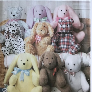 May include: Simplicity Crafts pattern featuring various stuffed animal designs, including bears, bunnies, and dogs. The pattern includes instructions for creating plush toys in different colors and patterns. The text "ONE SIZE" is visible.