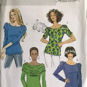 May include: A Butterick B5562 sewing pattern envelope for tops in size Y (Xsm-Sml-Med). The illustration displays four variations of long and short-sleeved tops with gathered shoulder details and different necklines, including a cowl neck option.