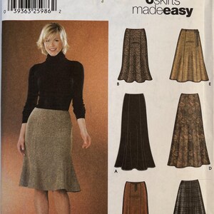 May include: Simplicity sewing pattern 5914 for six skirt styles in sizes HH 6, 8, 10, 12. The envelope features illustrations of various skirt designs, including A-line and flared silhouettes with different textures and patterns, alongside a photograph of a model wearing a knee-length skirt.