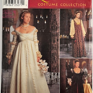 May include: Simplicity 0657 Renaissance Costume Collection sewing pattern envelope for sizes U 16, 18, 20. The cover displays three variations of long-sleeved, floor-length gowns with empire waists, featuring cream, dark red, and black fabric designs.