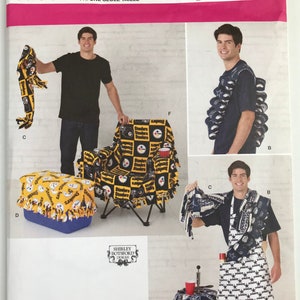 May include: A sewing pattern for a Steelers themed chair, cooler, and table cover. The pattern is from Simplicity and includes instructions for making a chair cover, a cooler cover, and a table cover. The pattern is for one size and is available in English, French, and Spanish.
