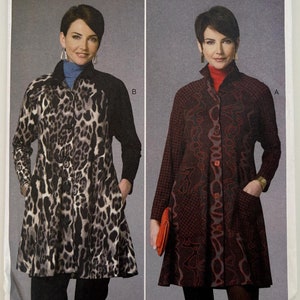 May include: A Butterick sewing pattern, B6254, featuring two coat designs. One coat has a black and white animal print, and the other is a dark red pattern. The pattern includes sizes X-Small to Medium.