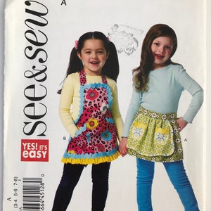 See&Sew 5942 Children's/Girls' Aprons: Half or Full Apron with pockets, bias binding, trim, ties sewing pattern Sizes 3-4, 5-6, 7-8 UNCUT