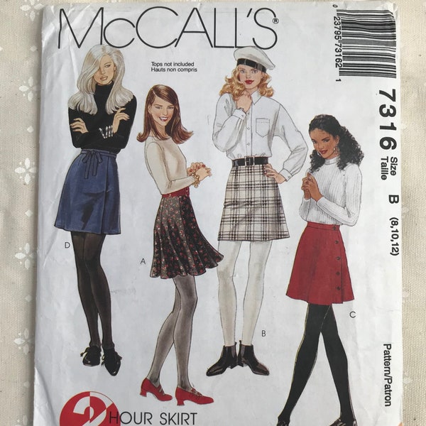 McCall's 7316 90s skirt: Princess seam flared or A-line skirt above knee Wrap skirt back zip darts Sewing Pattern Sizes 8-10-12 UNCUT
