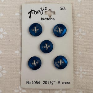 Blue buttons- darker, almost navy blue, 1/2 inch, by Pacific, plastic, 5 buttons per card, 4-hole buttons, Made in Japan