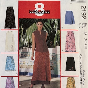 May include: A McCall's 2192 sewing pattern envelope featuring 8 variations of a sleeveless vest and a wrap skirt. The cover displays a model wearing a brown vest and a long, patterned orange wrap skirt, with various skirt designs shown around the border.