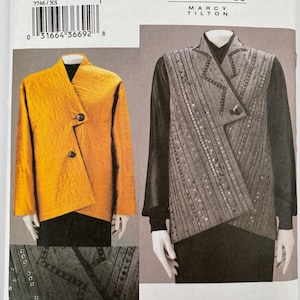 May include: A sewing pattern featuring two jacket designs. One jacket is mustard yellow with a wrap-style front and two buttons. The other is a gray vest with sequin details and a diagonal design. The pattern includes sizes XS, S, and M.