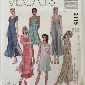May include: McCall's sewing pattern featuring various dress designs. The pattern includes illustrations of dresses in different styles and lengths, with a focus on V-necklines and floral prints. The pattern number is 2115, and the size is C (10,12,14).