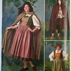 May include: A Simplicity sewing pattern for costumes. The pattern features three different costume designs, including a cape, dress, and bodice. The costumes are in various colors, including brown, green, and red. The pattern includes sizes 8-18/XS-XL. The word "Costumes" is in a green, cursive font.