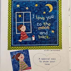 May include: A quilt pattern titled Love You To The Moon featuring a blue night sky with stars, a yellow crescent moon, and a child looking out a window. The text reads I love you to the moon and back. Includes a girl version and the text A special way To show your love.