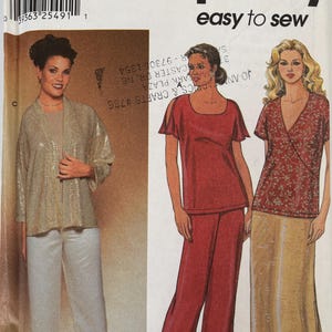 May include: A Simplicity 7026 sewing pattern envelope for sizes 18W-24W. The front displays illustrations of three outfits: a gold sequined jacket with light pants, a red short-sleeved top with matching pants, and a red floral wrap top with a long skirt.