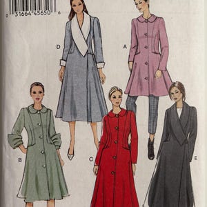 May include: Vogue basic design sewing pattern featuring five coat designs. The pattern includes a variety of styles, including a long red coat, a gray coat with a shawl collar, and a light blue coat with a white collar. The pattern number is V9040.