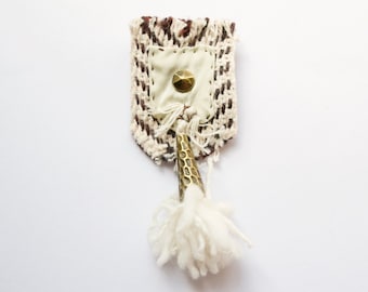Taking in the Culture  // One-of-a-kind hand-stitched mixed media brooch / black and cream, wool and bronze tassel / textile jewelry art pin