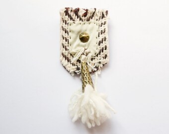 Taking in the Culture  // One-of-a-kind hand-stitched mixed media brooch / black and cream, wool and bronze tassel / textile jewelry art pin