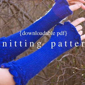 May include: A pair of blue knitted arm warmers with a ruffled edge. The text "{downloadable pdf} knitting pattern" is visible in the image.