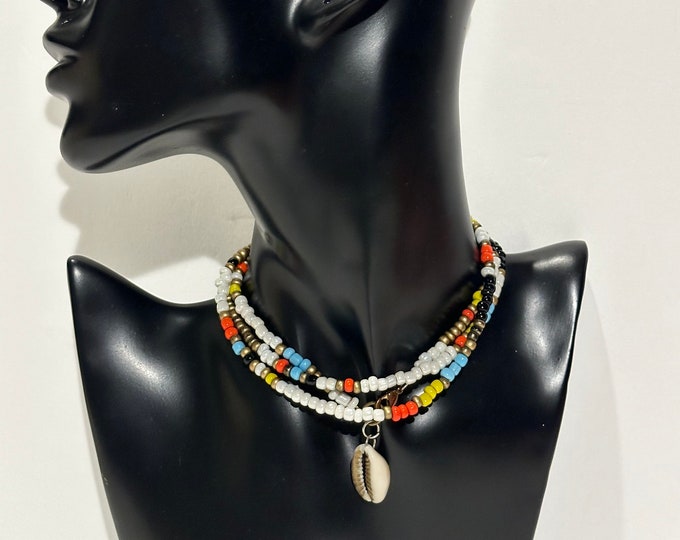 Multicoldored Beaded Necklace or Bracelet with cowrie shell