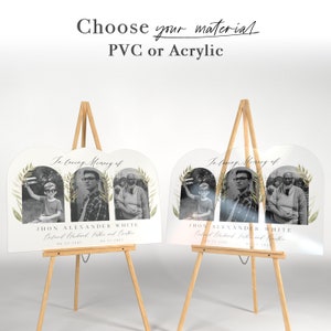 May include: Two white acrylic memorial signs with a green watercolor archway and three black and white photos of a man and two boys. The text on the sign reads "In loving memory of JHON ALEXANDER WHITE Beloved Husband, Father and Brother 04-23-1945 09-23-2023".
