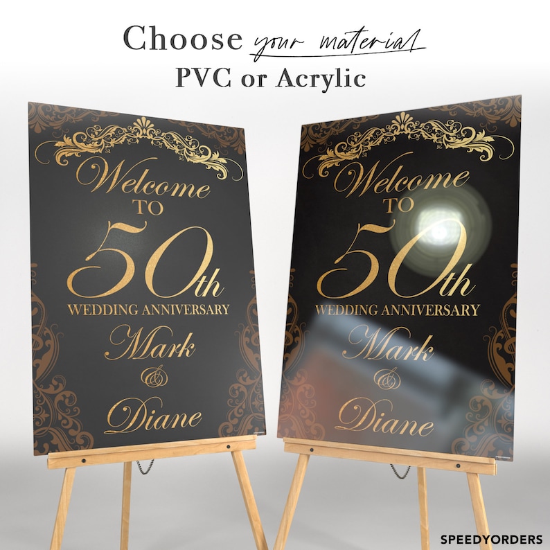 May include: Two rectangular wedding anniversary signs on wooden easels. The signs feature a black background with gold ornate scrollwork borders and gold text reading Welcome to 50th Wedding Anniversary Mark & Diane. Text above reads Choose your material PVC or Acrylic.