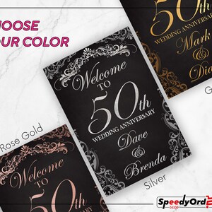 May include: Three rectangular wedding anniversary signs with black backgrounds and ornate decorative borders. The signs feature the text Welcome to 50th Wedding Anniversary with names like Dave and Brenda, Mark and Diane, in gold, silver, and rose gold.