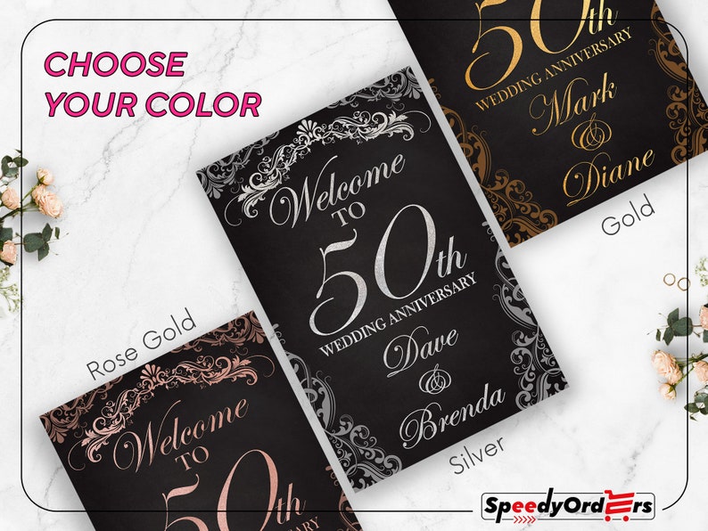 May include: Three rectangular wedding anniversary signs with black backgrounds and ornate decorative borders. The signs feature the text Welcome to 50th Wedding Anniversary with names like Dave and Brenda, Mark and Diane, in gold, silver, and rose gold.