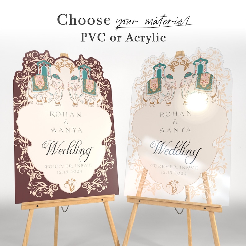 May include: Two arched wedding signs on wooden easels, one opaque maroon and one transparent acrylic. Both feature ornate gold and teal elephant illustrations, the text "ROHAN & AANYA Wedding FOREVER IN LOVE 12.15.2024", and "Choose your material PVC or Acrylic".