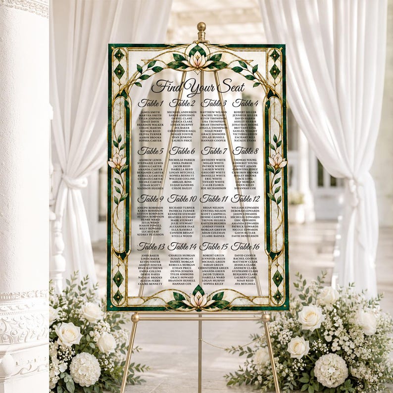 May include: A rectangular wedding seating chart sign featuring a dark green and gold stained glass-style border with white floral accents. The sign displays the text Find Your Seat followed by sixteen tables with lists of names printed in black.