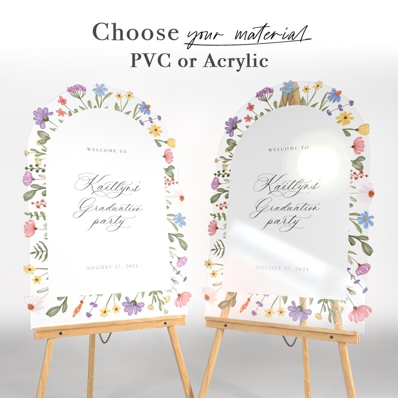 May include: Two arched signs for a graduation party, one opaque and one transparent, featuring a floral border with purple, blue, yellow, and pink flowers. The text reads "Choose your material PVC or Acrylic" and "WELCOME TO Kaitlyn's Graduation party AUGUST 17, 2024".