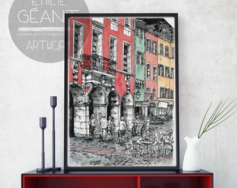 May include: Black and white ink drawing of a European street scene with colorful buildings. The drawing is framed and displayed on a red shelf with black legs.
