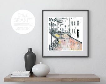 May include: Black and white ink drawing of a canal in a European city. The canal is lined with buildings and a bridge crosses the water. The water reflects the buildings and the sky. The drawing is framed in a black frame.
