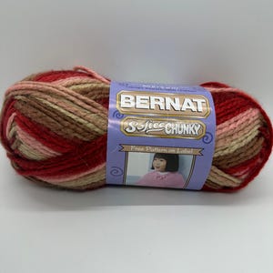 Bernat Softee Chunky yarn in Native Ombre, Red Brown Ombre