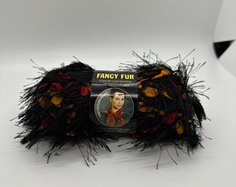 Discontinued yarn, Lion Brand Fancy  Fur  Yarn in Jungle Print Black. Eye lash yarn in Variegated Black.