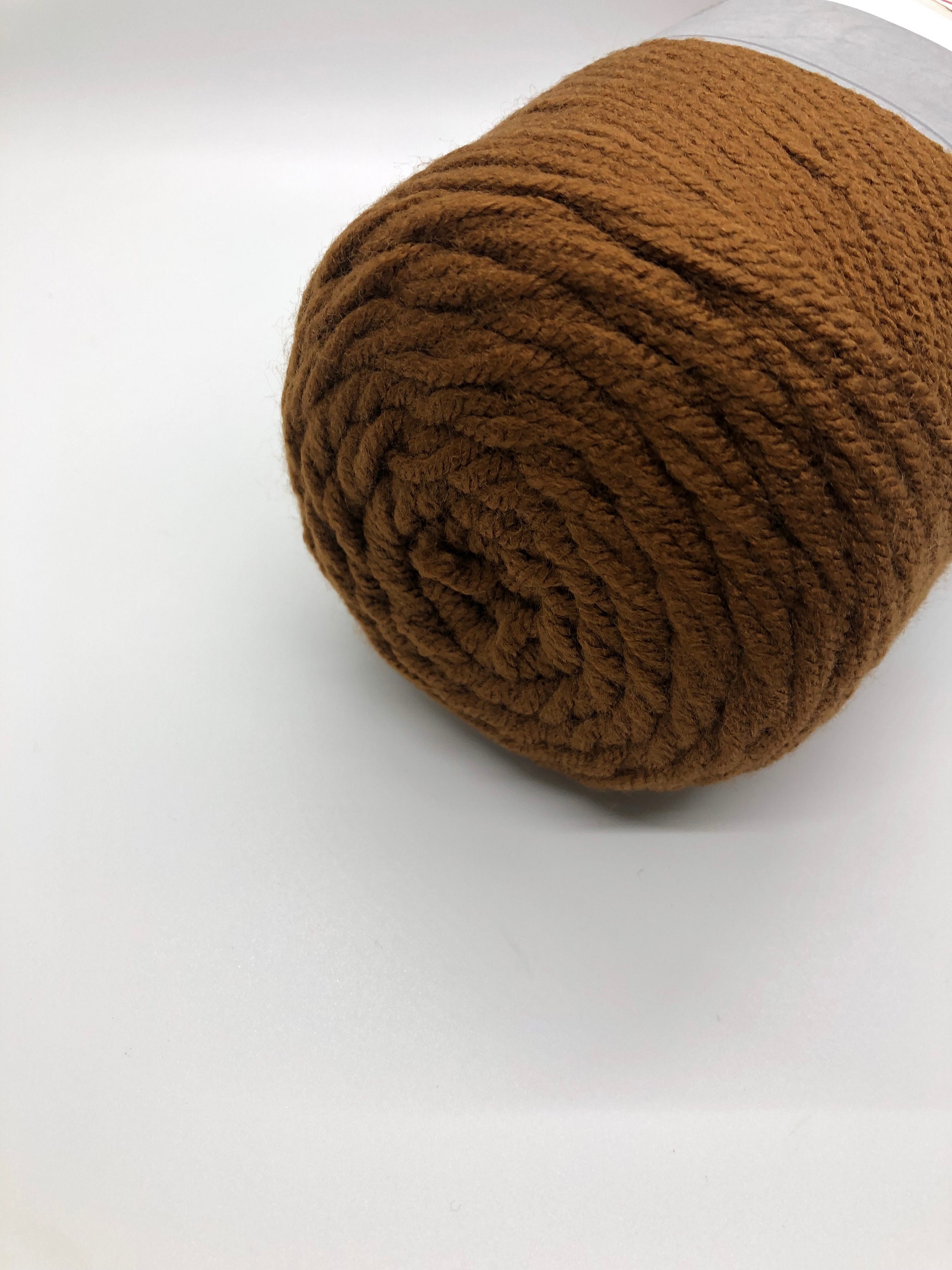 Anyone know of a dark-ish beige/tan yarn like the one in this pic