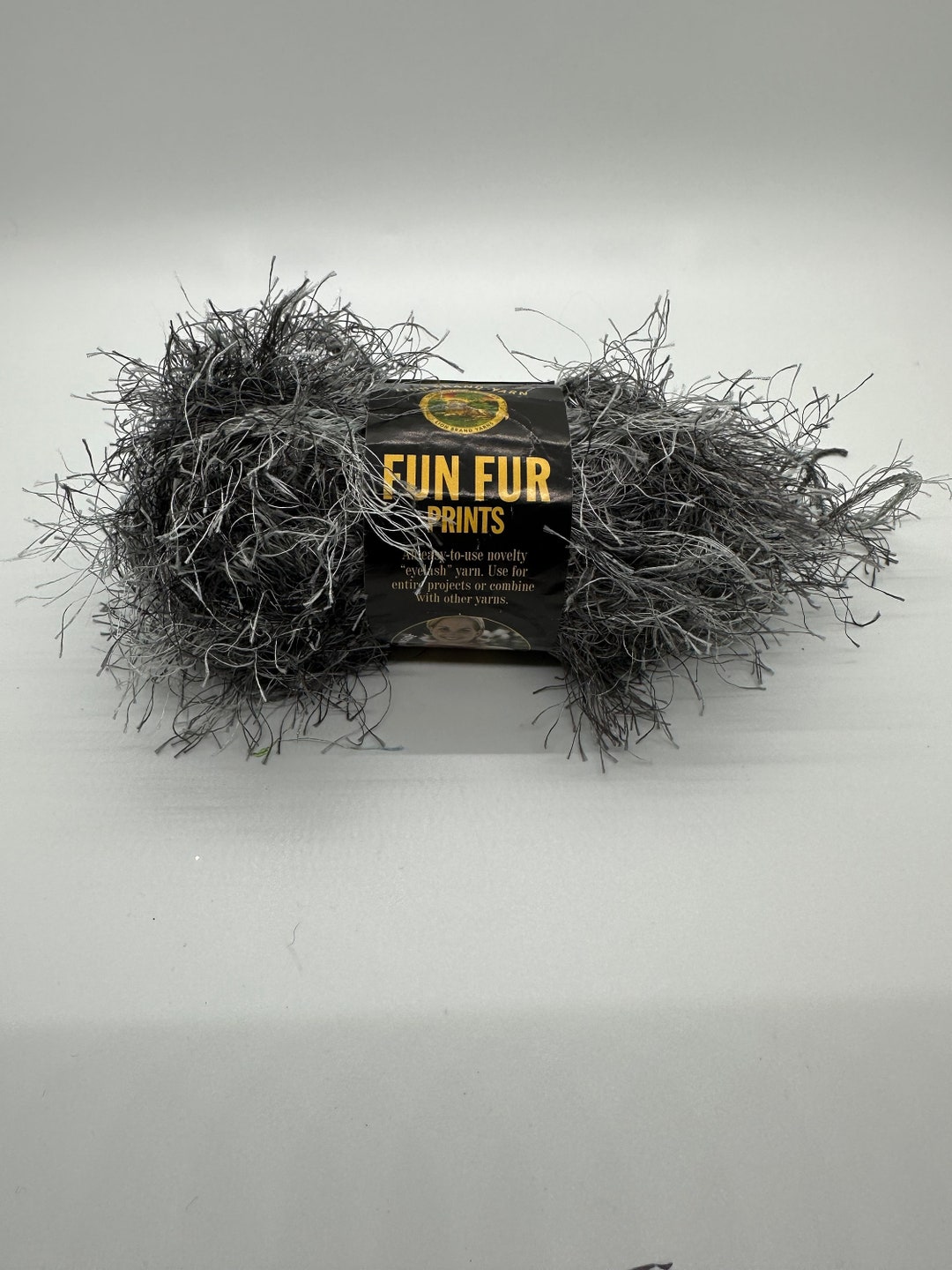 Discontinued Yarn, Lion Brand Fancy Fur Yarn in Jungle Print Black. Eye  Lash Yarn in Variegated Black. 
