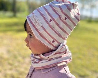 Creamy white hat and neck warmer or scarf for girls with powder pink stripes. Spring hat with red hearts.