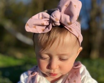 Adjustable baby hair band with knot. Girl's headband with bow.