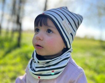 White and black striped hat and neck warmer or scarf for girls. Spring hat with red hearts.