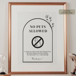 May include: A printable sign with a black and white design that says "No Pets Allowed". The sign has a cat silhouette with a red circle and diagonal line through it. The text says "To Keep Our Space Clean and Allergen-Free. We Kindly Request No Pets Allowed. We Appreciate Your Understanding! Thank you!"
