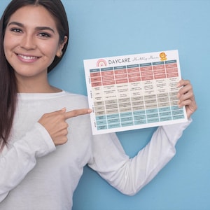 May include: A woman points to a printable daycare schedule with a colorful rainbow and a cartoon lion. The schedule is titled "Daycare Weekly Schedule".