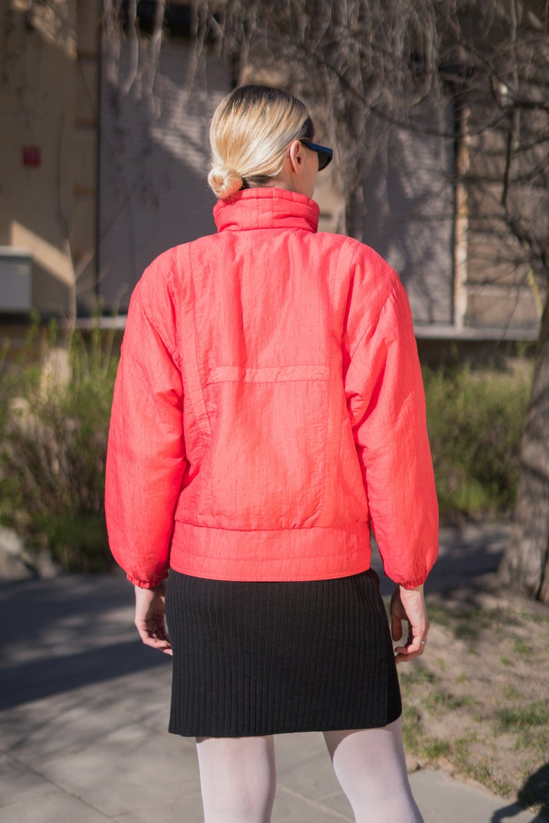 neon orange ski jacket